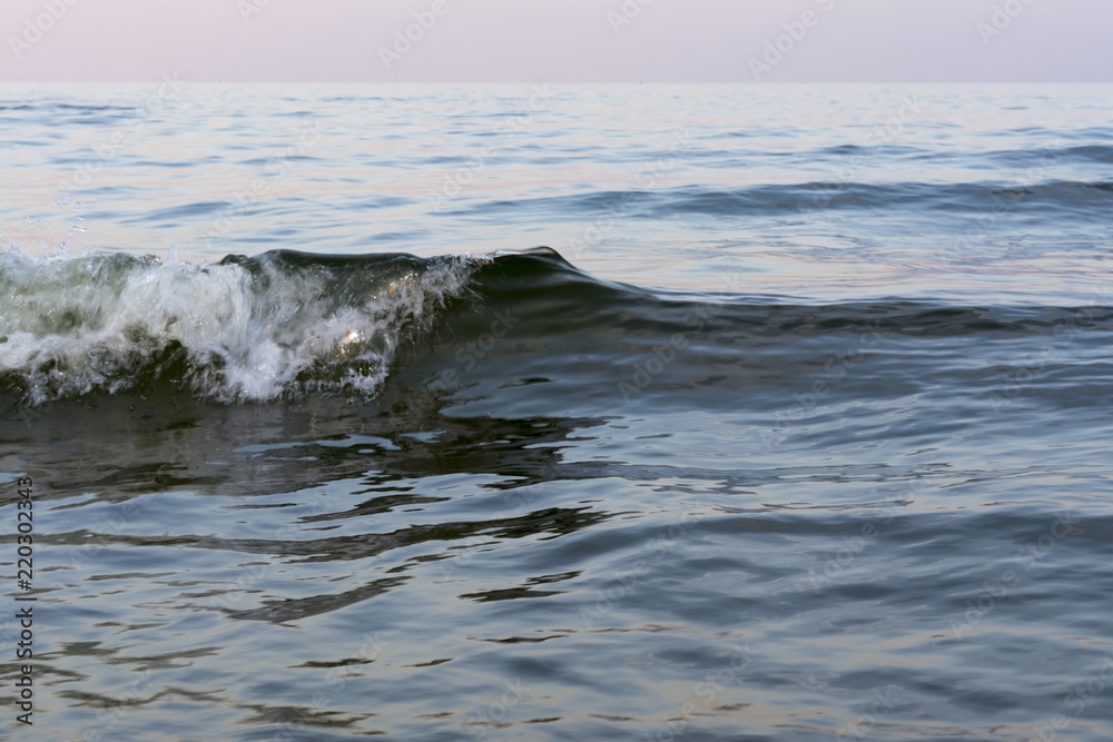 the night sea with waves and foam, sea sky after sunset time, nature abstract background the night sea with waves and foam, sea sky after sunset time, nature abstract background