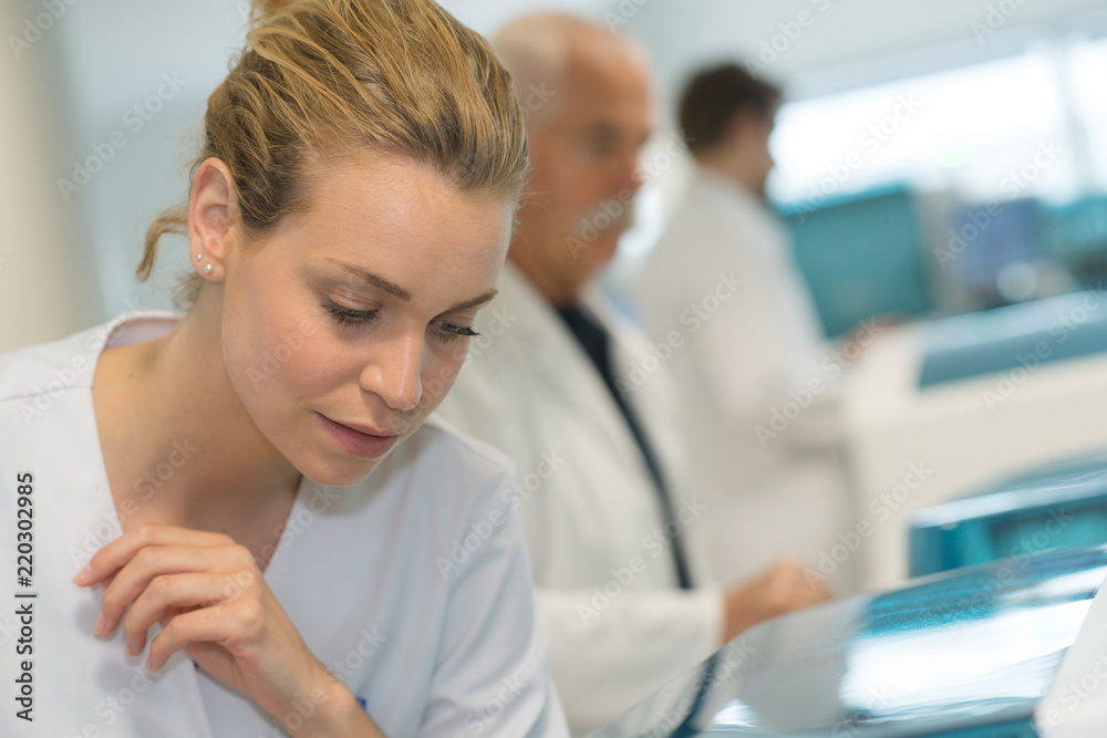 female doctor working in a lab female doctor working in a lab