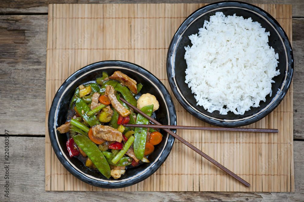 chinese stir fry in wok with beef and vegetables chinese stir fry in wok with beef and vegetables