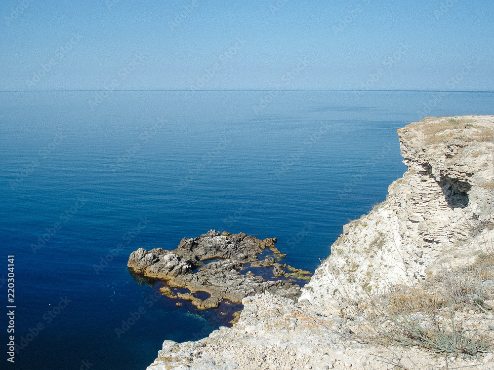 Aerial view of a rocky and sea. Summer vacation time. Amazing nature background. Color of the water and beautifully bright. Clear water at sunny day. Aerial view of a rocky and sea. Summer vacation time. Amazing nature background. Color of the water and beautifully bright. Clear water at sunny day.