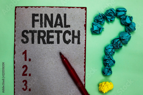 Handwriting text writing Final Stretch. Concept meaning Last Leg Concluding Round Ultimate Stage Finale Year ender Gray paper marker crumpled papers forming question mark green background