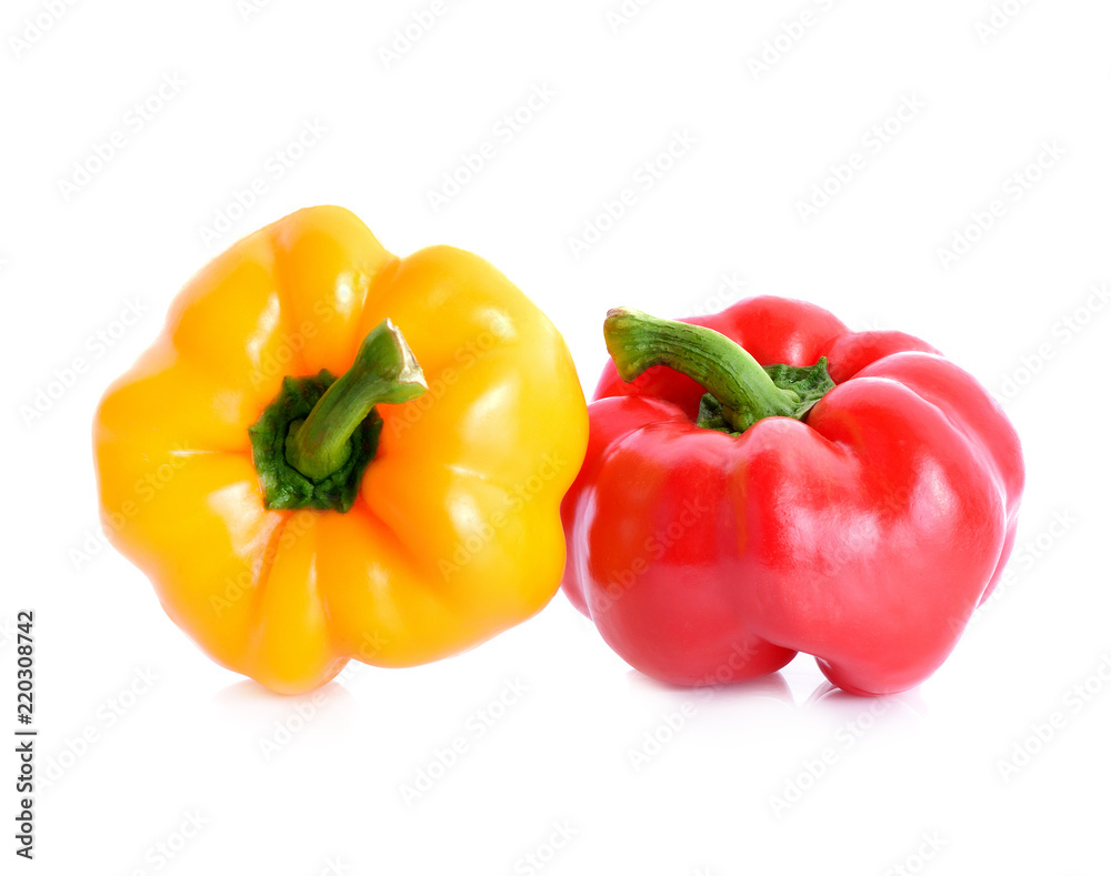 colored peppers over white background colored peppers over white background