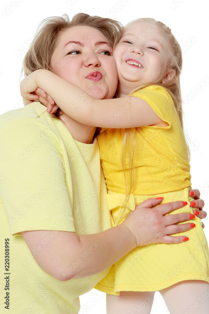Mom and little daughter plus the size of the model, gently embra Mom and little daughter plus the size of the model, gently embra