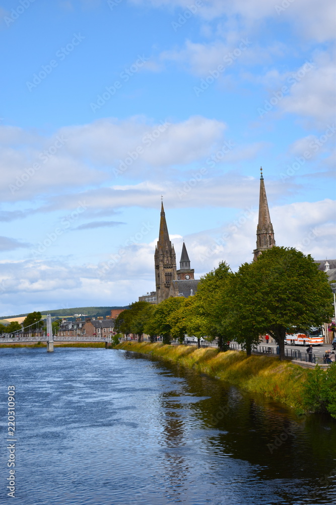 Cross the river on the bridges and you can visit parks and coffee shops. Inverness, Scotland, UK, August, 2018