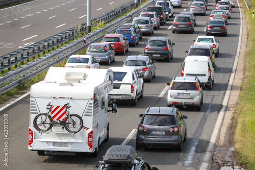 Rear view of traffic jam of lined up cars