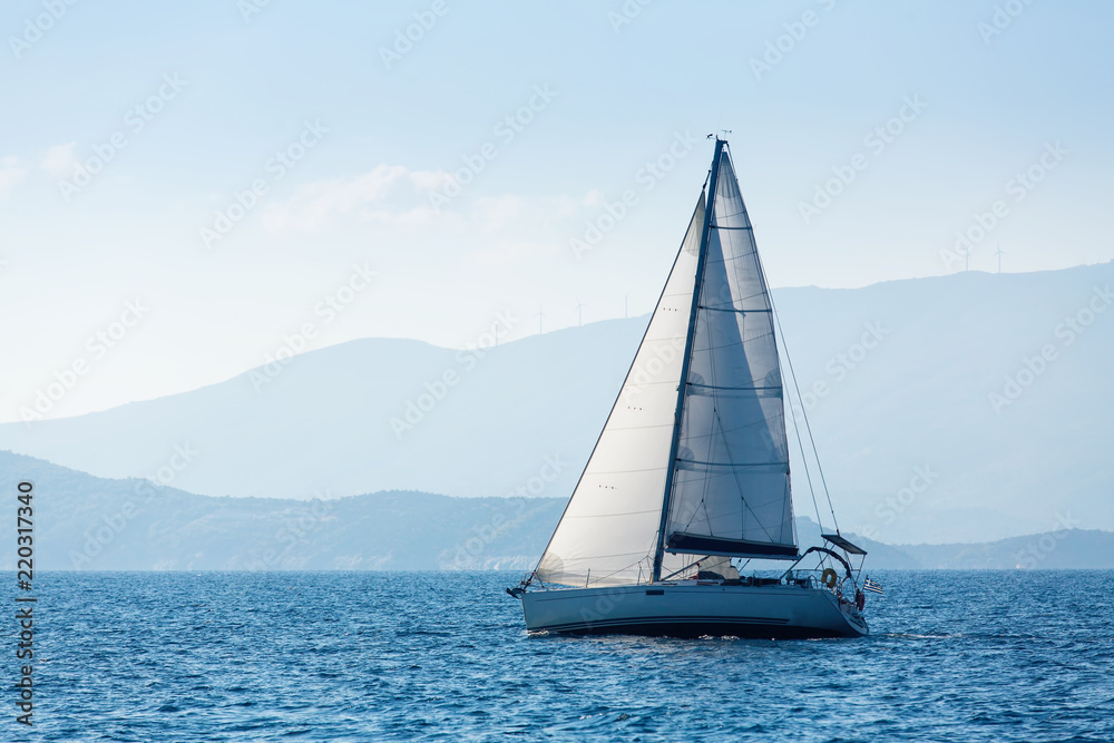 Greece sailing yacht boat at the Sea. Luxury cruise yachting.