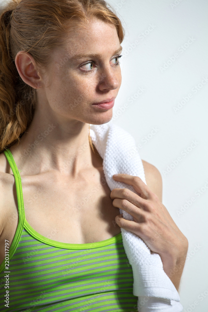 Healthy fit woman exercising isolated on white. Healthy fit woman exercising isolated on white.