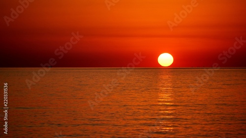 Fototapeta Naklejka Na Ścianę i Meble -  Full sun disc over the Black Sea, Sunset in Sochi