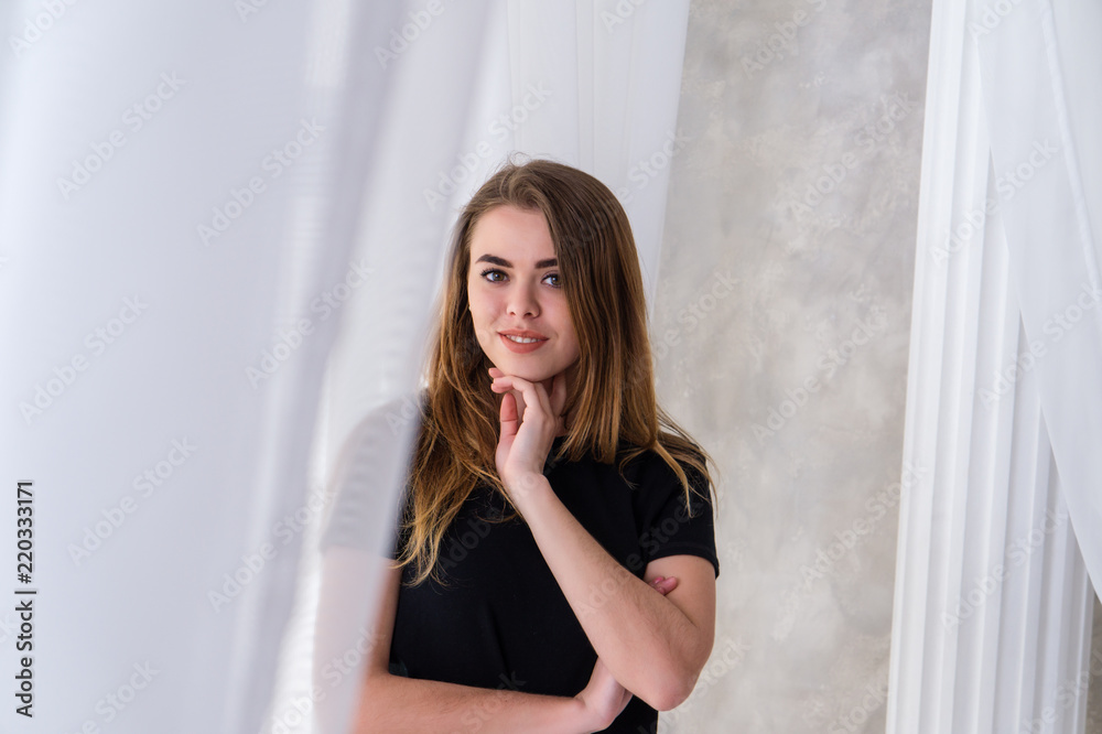 fashion portrait of a young girl in studio. fashion portrait of a young girl in studio.
