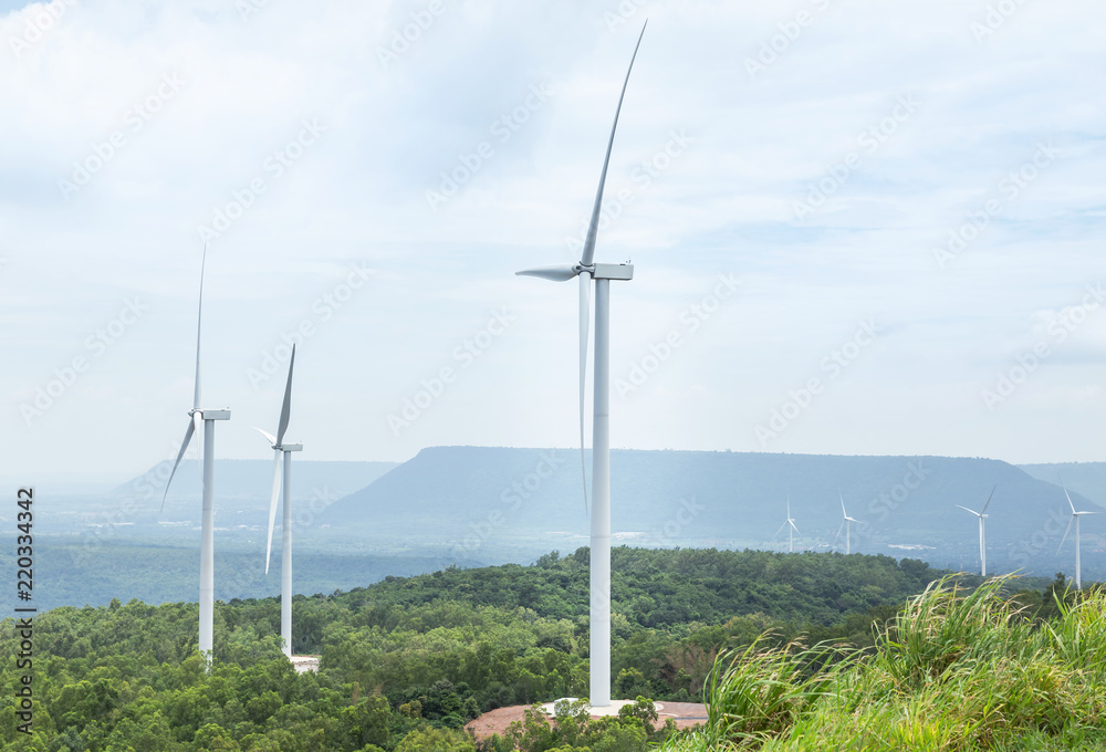 White wind turbines generating electricity in wind power station at Lam Takhong reservoir dam, Nakhon Ratchasima, Thailand White wind turbines generating electricity in wind power station at Lam Takhong reservoir dam, Nakhon Ratchasima, Thailand