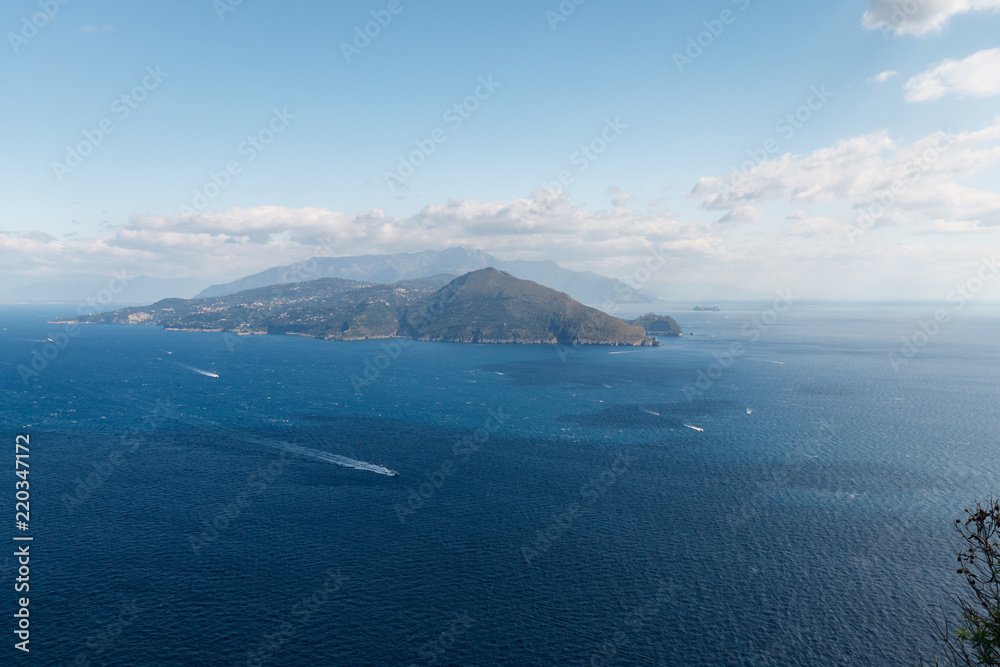 Beautiful aerial view of Napoli gulf from Capri island, with boat trails on the water