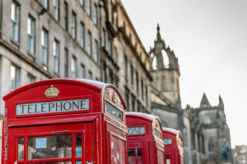 Red phone booths across the famous Royal Mile in Edinburgh  Scotland
