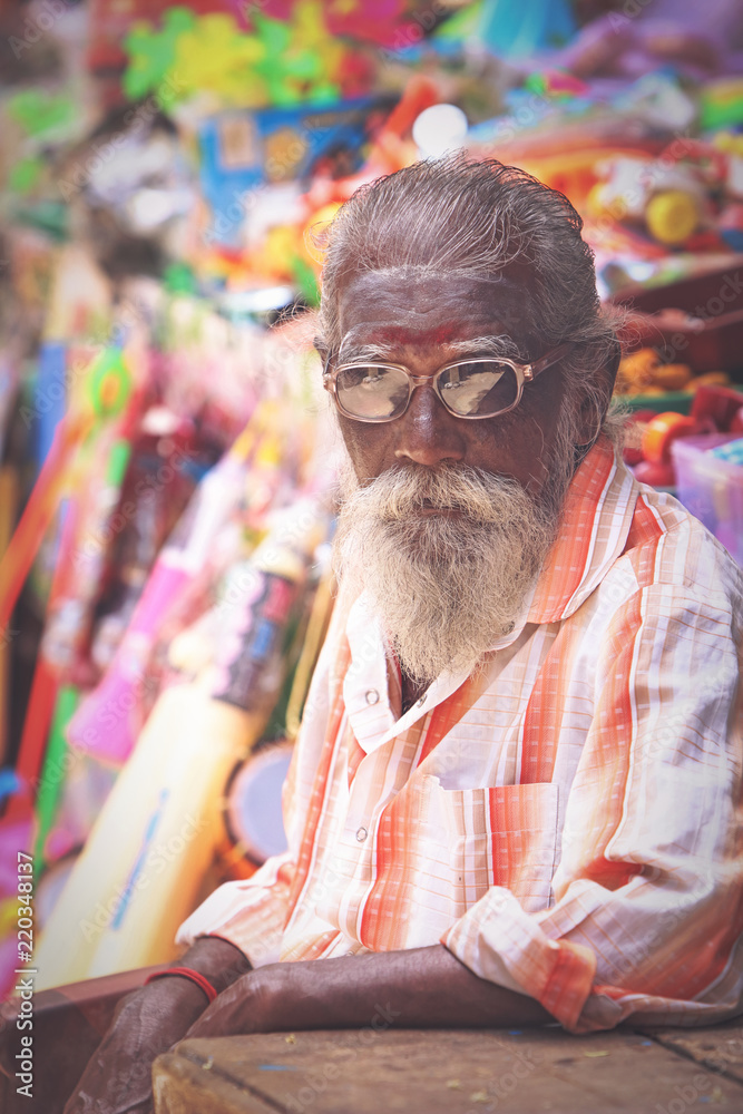 Indian Aged Sales Man Posing to Camera
