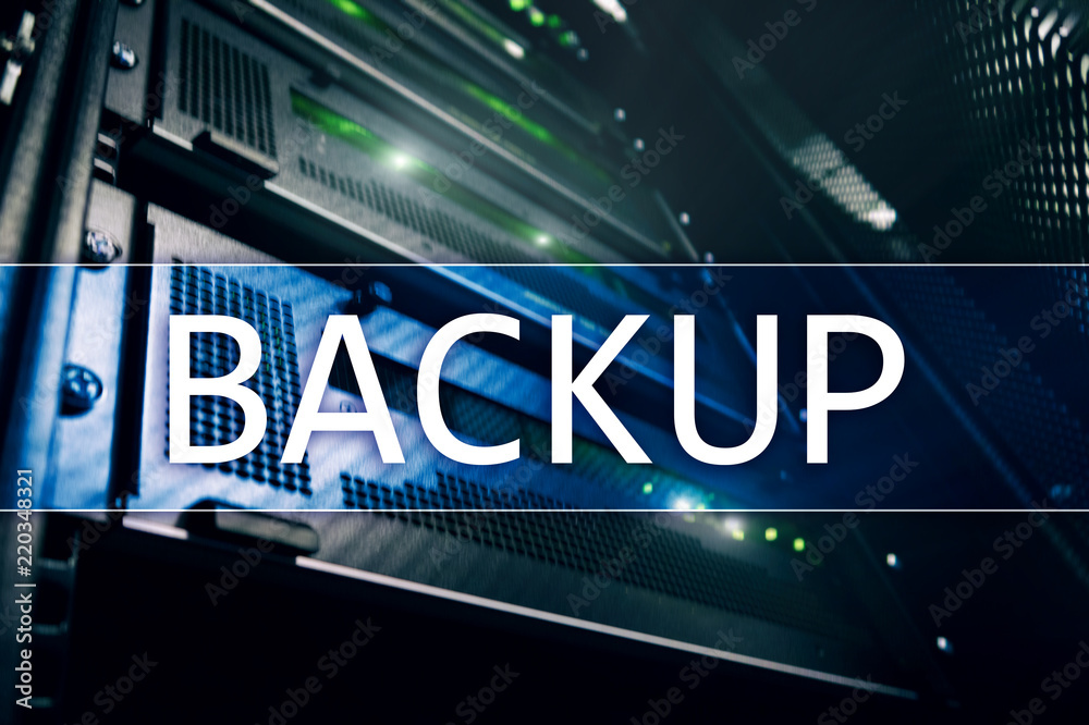 Backup button on modern server room background. Data loss prevention. System recovery.