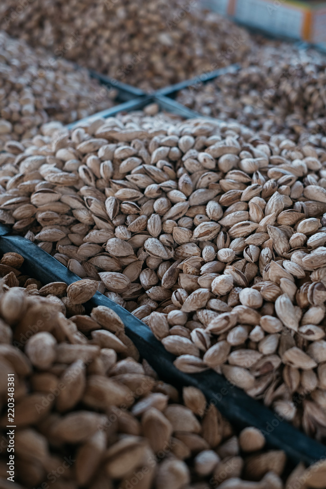 Obraz premium Fresh nuts and dried fruit at the bazaar in Osh, Kyrgyzstan 