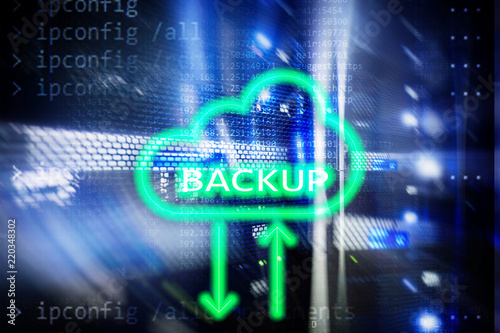 Backup button on modern server room background. Data loss prevention. System recovery.