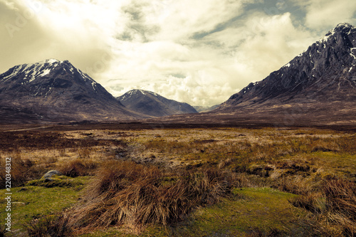 Buachaille Etive Mor mountain in the Highlands of Scotland, under a dramatic sky