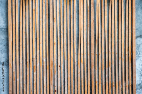 Modern wooden brown lath decoration on facade