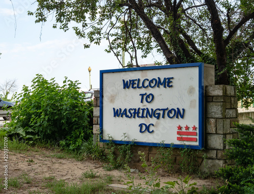 Welcome to Washington DC sign leading to Key Bridge on the way to Georgetown 