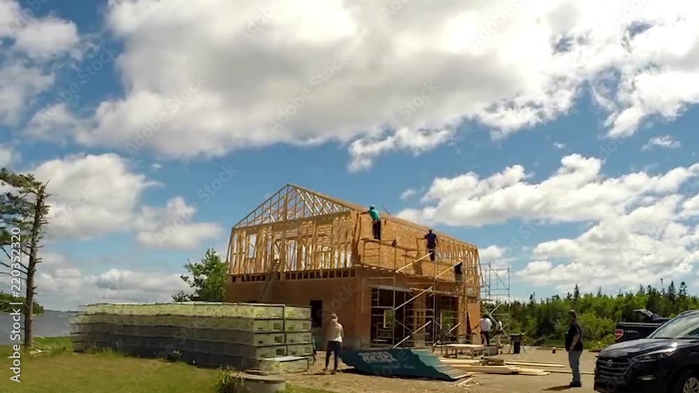 Building a barn under fluffy clouds Building a barn under fluffy clouds