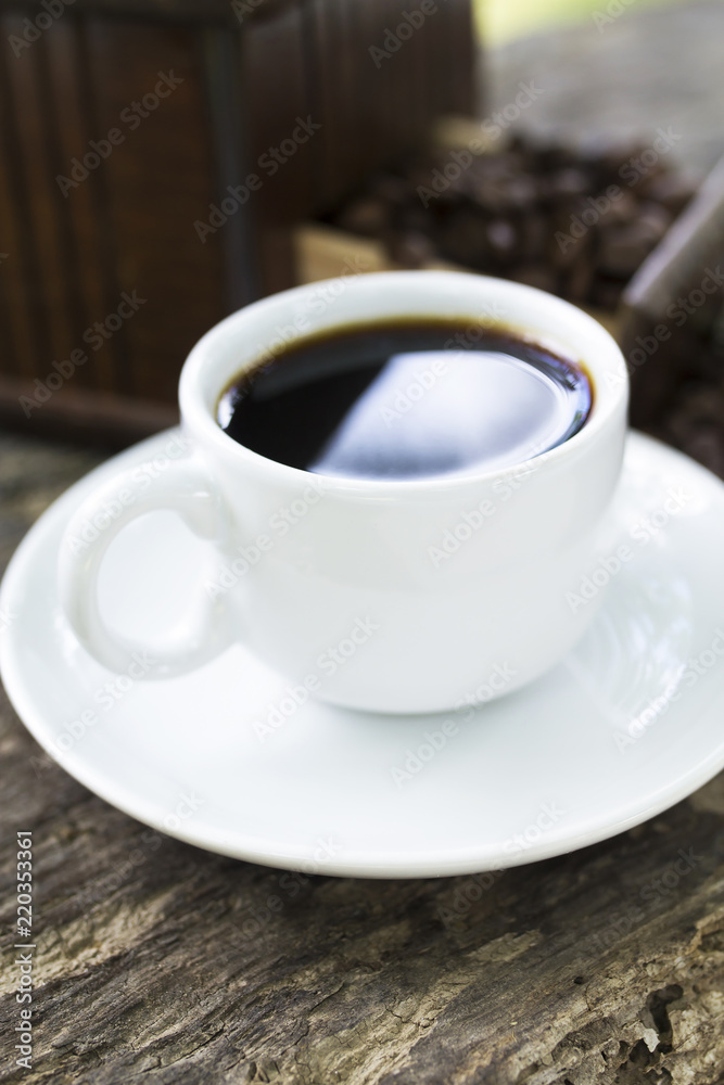 coffee grinder and cup with coffee with background coffee grinder and cup with coffee with background