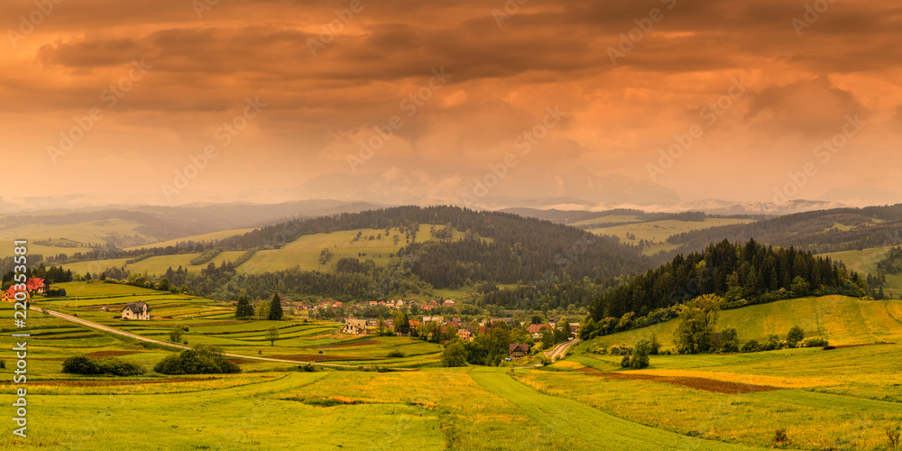 Pieniny Panorama with a view of the Tatras at sunrise.
