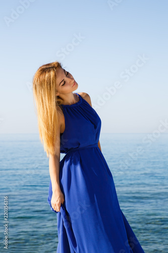 Blond woman in blue