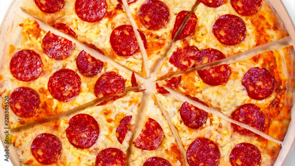 A video of the moving background slices pepperoni pizza. Footage. A video of the moving background slices pepperoni pizza. Footage.