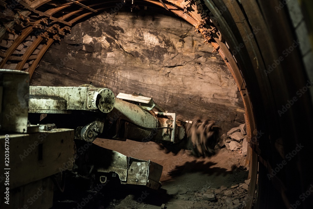 Roadheader drills the tunnel in rock Roadheader drills the tunnel in rock
