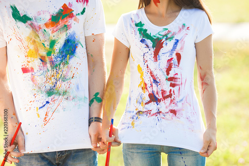 Fototapeta Naklejka Na Ścianę i Meble -  People wearing dirty t-shirts