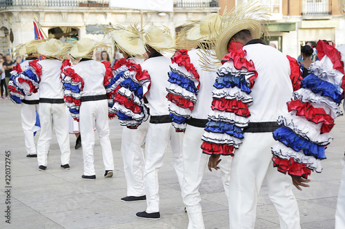 Dancers wearing one of the folk costume of Cuba ready to dance