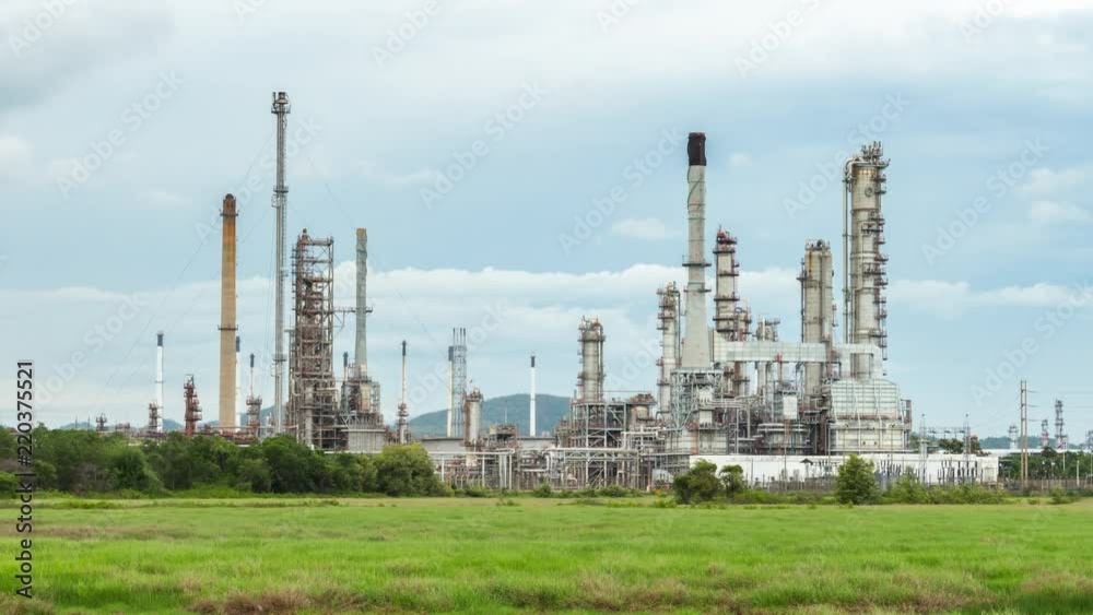 Time lapse of oil refinery industry plant, petroleum manufacturing, day time Time lapse of oil refinery industry plant, petroleum manufacturing, day time