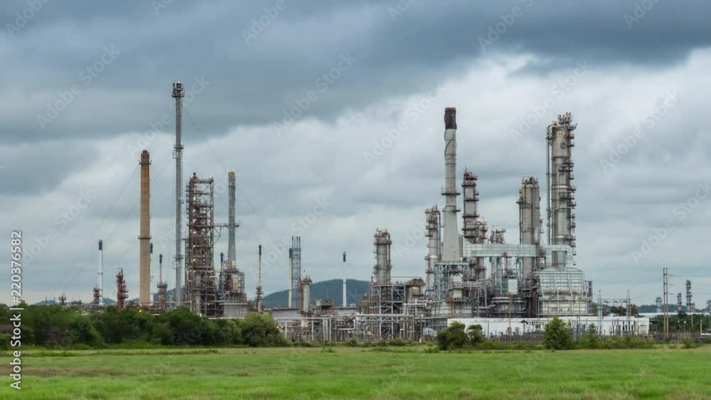 Time lapse of oil refinery industry plant, petroleum manufacturing, day to night time Time lapse of oil refinery industry plant, petroleum manufacturing, day to night time