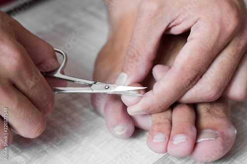 nail clipping  close up trimming toenails