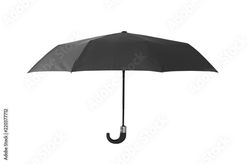 Open black umbrella isolated on white with clipping path photo