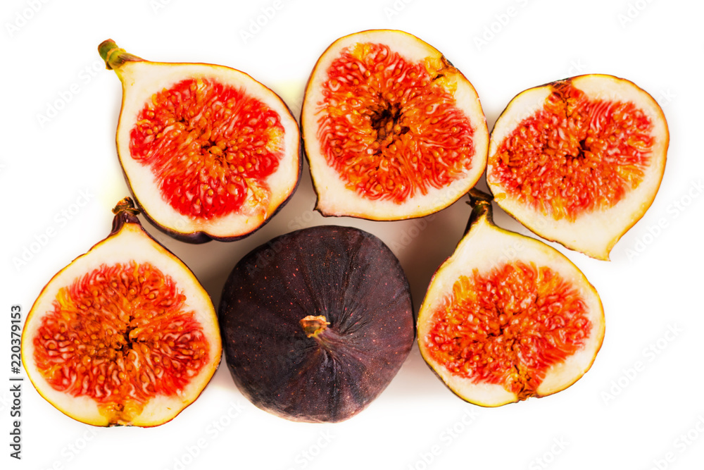Fresh figs. Fruit with half isolated on white. Fresh figs. Fruit with half isolated on white.