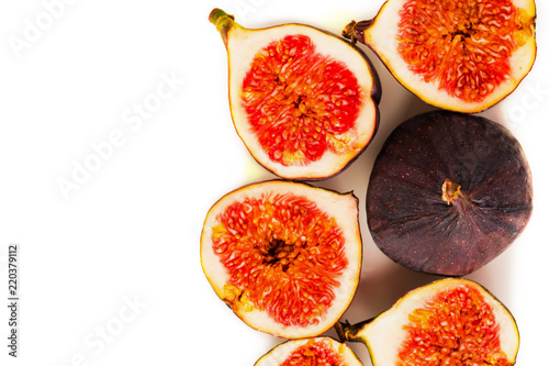 Fresh figs. Fruit with half isolated on white.