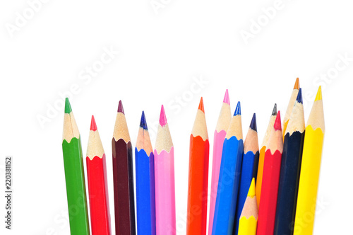 Colored pencils in pencil case isolated on white background.
