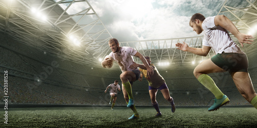 Photography Rugby players fight for the ball on professional rugby stadium