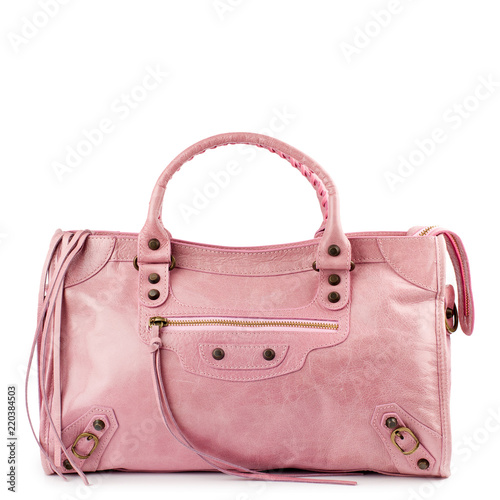 Pink handbag isolated on white background.