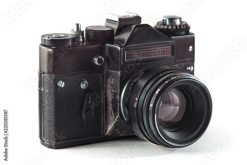 Retro vintage film camera on white background