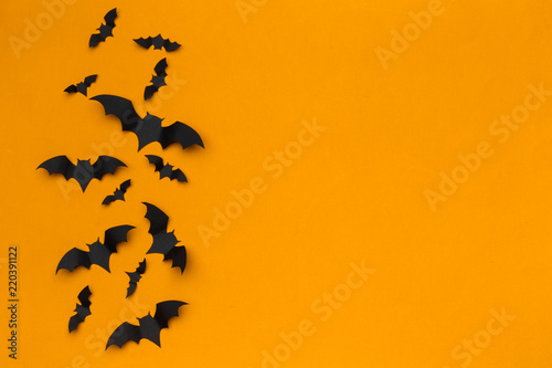 Fototapet halloween and decoration concept - paper bats flying