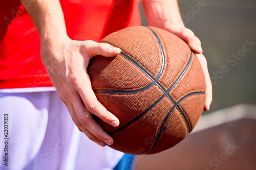 man holding a basketball