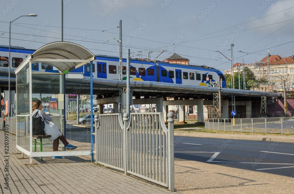 Obraz premium CITYSCAPE - Regional train on the viaduct in Szczecin