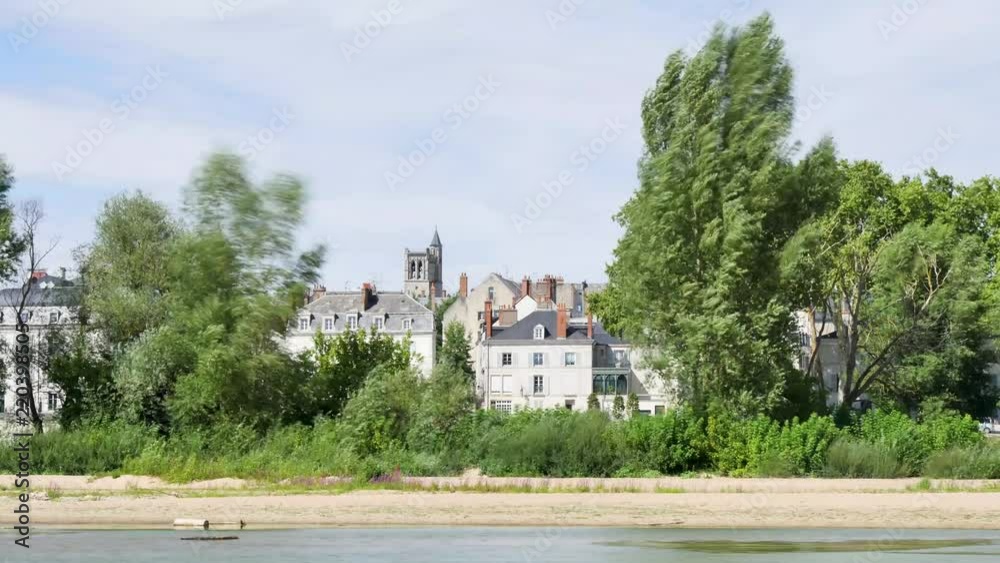 Orléans is a prefecture and commune in north-central France. Time lapse from the river. There is a tower of the old city. Orléans is a prefecture and commune in north-central France. Time lapse from the river. There is a tower of the old city.
