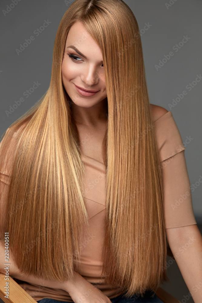 Naklejka premium Hair Beauty. Beautiful Woman With Healthy Long Straight Hair 
