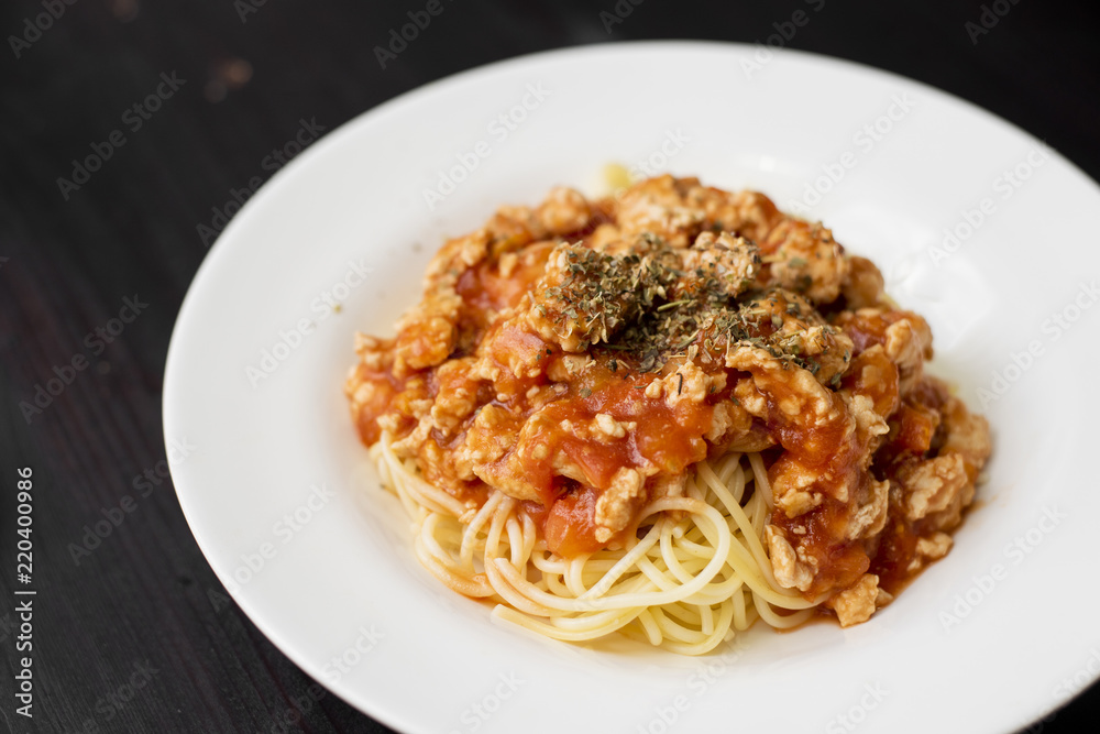 Spaghetti on black wooden background Spaghetti on black wooden background