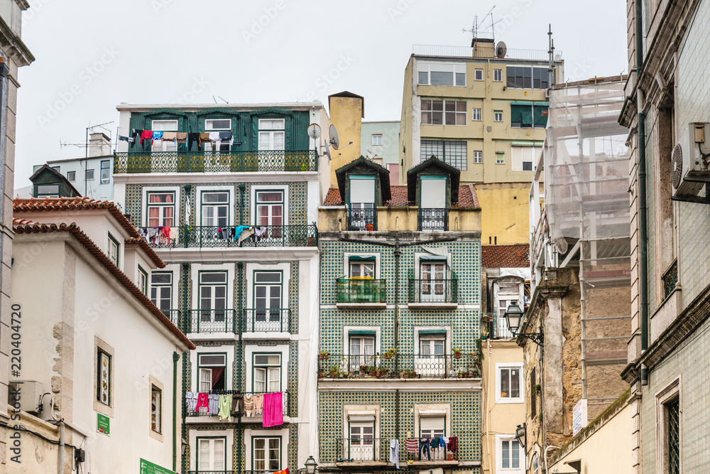 Lisbon, Portugal.- February 11, 2018: Old Town Lisbon. street view of typical houses in Lisbon, Portugal, Europe