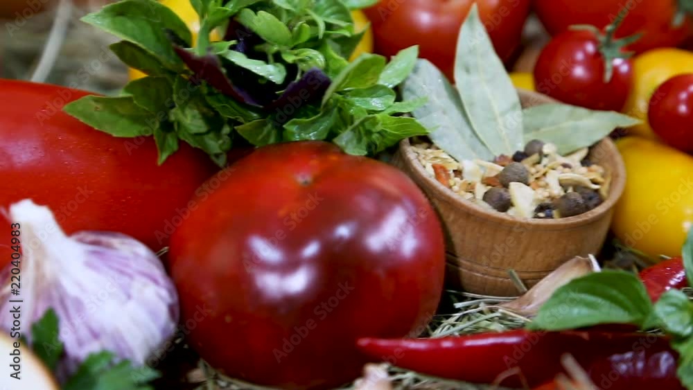 Red, yellow peppers, tomatoes, onions, red chili, garlic on fresh hay Red, yellow peppers, tomatoes, onions, red chili, garlic on fresh hay