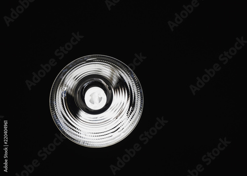 CFL Light Bulb in the Dark Ceiling background